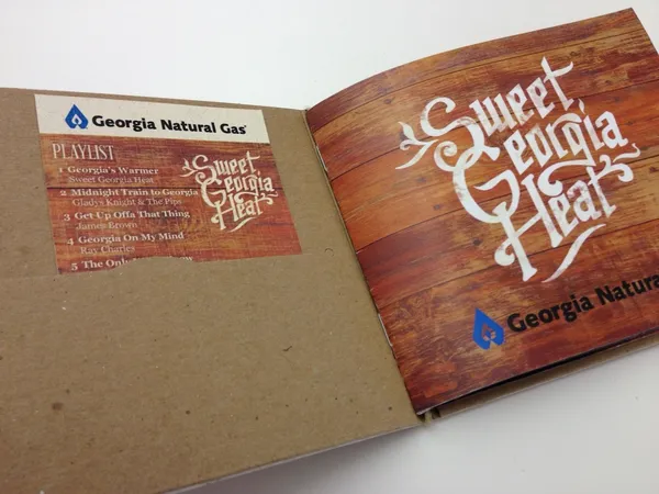 The Sweet Georgia Heat CD booklet open to its playlist, starting with Georgia’s Warmer